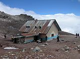Ecuador Chimborazo 04-02 Whymper Refuge Outside Whymper Refuge (5000m) is a tin-roofed A-frame building with some basic accommodation and facilities.